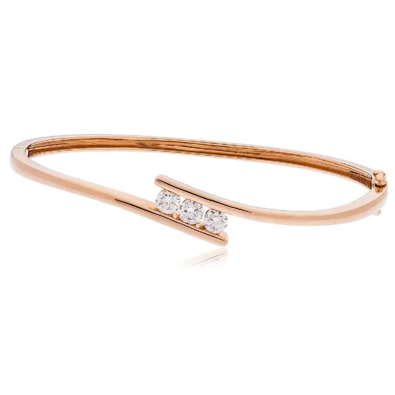 Women’s luxury cuff bracelets-DIAMOND THREE STONE CROSS OVER BANGLE IN 18K ROSE GOLD