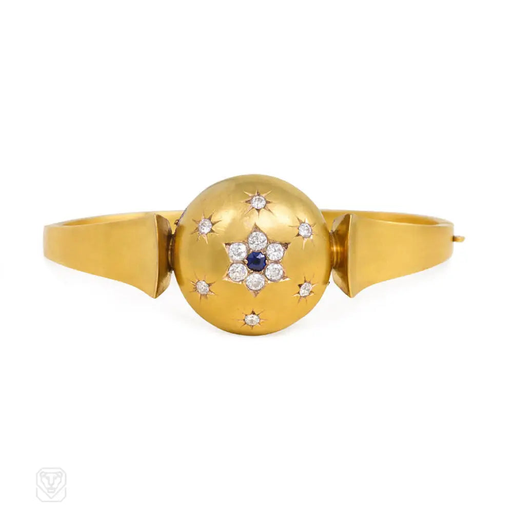 Women’s stylish leather bangles-Antique gold bangle with central diamond and sapphire flower