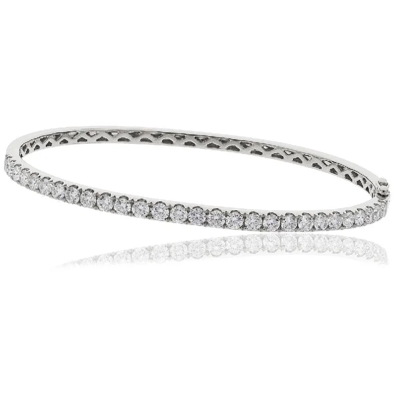 Women’s fashion cuff bangles-DIAMOND HALF SET BANGLE IN 18K WHITE GOLD